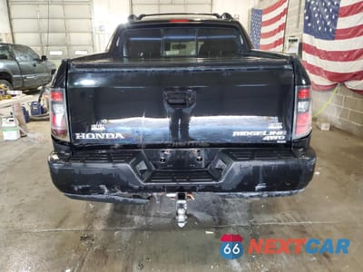 Zdjęcie 6 z 12 samochodu: 2013 HONDA RIDGELINE SPORT VIN:5FPYK1F75DB009945 - miniatura