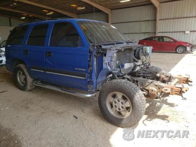 Czwarte zdjęcie samochodu z boku: 2001 CHEVROLET TAHOE K1500 VIN:1GNEK13T01R165305 - miniatura