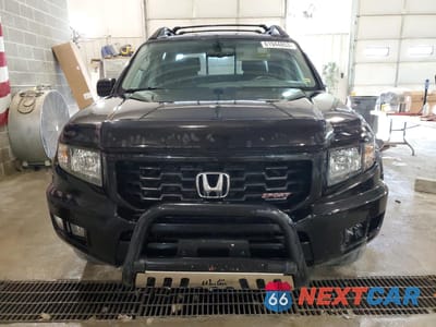 Piąte zdjęcie samochodu w środku: 2013 HONDA RIDGELINE SPORT VIN:5FPYK1F75DB009945 - miniatura
