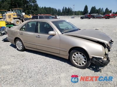 Czwarte zdjęcie samochodu z boku: 2000 MERCEDES-BENZ E 320 VIN:WDBJF65J4YB057100 - miniatura