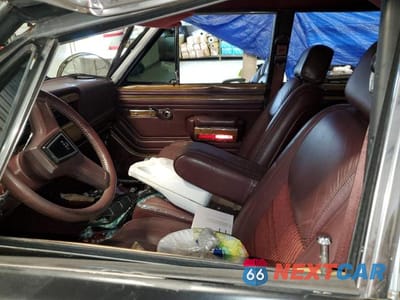 Zdjęcie 7 z 12 samochodu: 1988 JEEP GRAND WAGONEER VIN:1JCNJ15U7JT193363 - miniatura