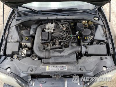Zdjęcie 13 z 14 samochodu: 2001 LINCOLN LS VIN:1LNHM87A71Y663665 - miniatura