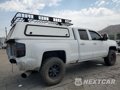 Trzecie zdjęcie samochodu z tyłu: 2016 CHEVROLET SILVERADO K1500 LT VIN:1GCVKREC4GZ266134 - miniatura