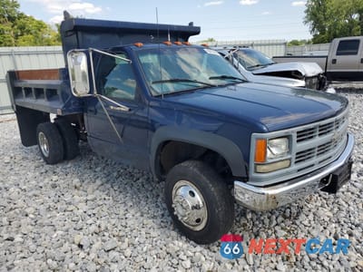 Czwarte zdjęcie samochodu z boku: 1999 CHEVROLET GMT-400 K3500 VIN:1GBJK34F2XF076667 - miniatura