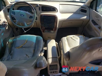Zdjęcie 8 z 13 samochodu: 2002 FORD WINDSTAR LIMITED VIN:2FMDA58492BB46350 - miniatura