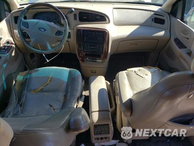 Zdjęcie 8 z 13 samochodu: 2002 FORD WINDSTAR LIMITED VIN:2FMDA58492BB46350 - miniatura