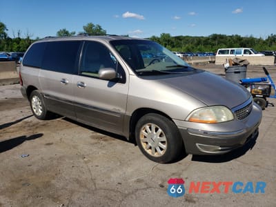 Czwarte zdjęcie samochodu z boku: 2002 FORD WINDSTAR LIMITED VIN:2FMDA58492BB46350 - miniatura