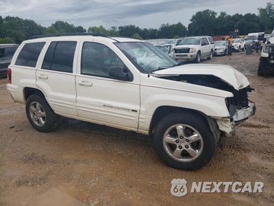 Czwarte zdjęcie samochodu z boku: 2003 JEEP GRAND CHEROKEE LIMITED VIN:1J4GX58S03C531077 - miniatura