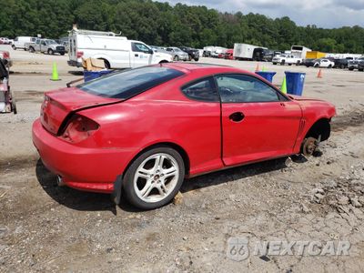 Trzecie zdjęcie samochodu z tyłu: 2004 HYUNDAI TIBURON GT VIN:KMHHN65F64U146613 - miniatura