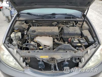 Zdjęcie 11 z 12 samochodu: 2002 TOYOTA CAMRY LE VIN:4T1BE32K42U532594 - miniatura