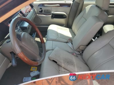 Zdjęcie 7 z 13 samochodu: 2004 LINCOLN TOWN CAR ULTIMATE LONG WHEELBASE VIN:1LNHM85W24Y652396 - miniatura
