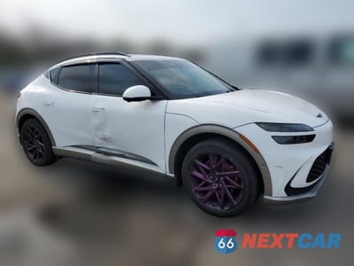 Czwarte zdjęcie samochodu z boku: 2023 GENESIS GV60 ADVANCED VIN:KMUKCDTC4PU004601 - miniatura