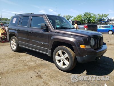 Czwarte zdjęcie samochodu z boku: 2014 JEEP PATRIOT LATITUDE VIN:1C4NJRFBXED684085 - miniatura