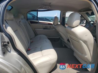 Zdjęcie 10 z 13 samochodu: 2004 LINCOLN TOWN CAR ULTIMATE LONG WHEELBASE VIN:1LNHM85W24Y652396 - miniatura