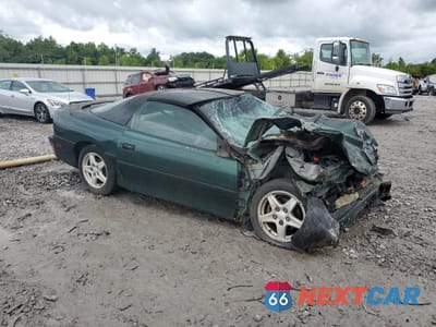 Czwarte zdjęcie samochodu z boku: 1997 CHEVROLET CAMARO BASE VIN:2G1FP22K8V2107263 - miniatura