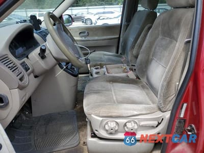 Zdjęcie 7 z 13 samochodu: 2005 KIA SEDONA EX VIN:KNDUP132256662909 - miniatura