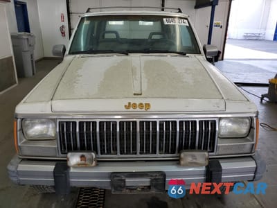Piąte zdjęcie samochodu w środku: 1990 JEEP CHEROKEE LAREDO VIN:1J4FJ57L1LL166898 - miniatura