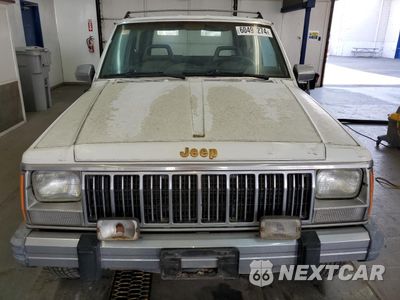 Piąte zdjęcie samochodu w środku: 1990 JEEP CHEROKEE LAREDO VIN:1J4FJ57L1LL166898 - miniatura