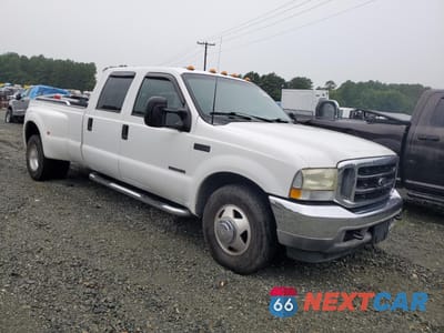 Czwarte zdjęcie samochodu z boku: 2002 FORD F350 SUPER DUTY VIN:1FTWW32F92EA26422 - miniatura