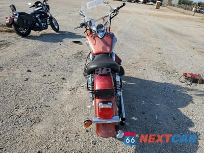 Czwarte zdjęcie samochodu z boku: 2002 KAWASAKI VN1500 N1 VIN:JKBVNAN1X2A016336 - miniatura