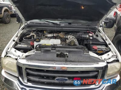 Zdjęcie 12 z 13 samochodu: 2002 FORD F350 SUPER DUTY VIN:1FTWW32F92EA26422 - miniatura