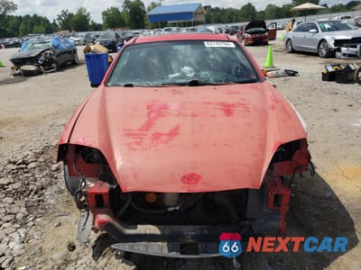 Piąte zdjęcie samochodu w środku: 2004 HYUNDAI TIBURON GT VIN:KMHHN65F64U146613 - miniatura