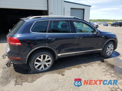 Czwarte zdjęcie samochodu z boku: 2014 VOLKSWAGEN TOUAREG V6 TDI VIN:WVGEP9BP4ED010414 - miniatura