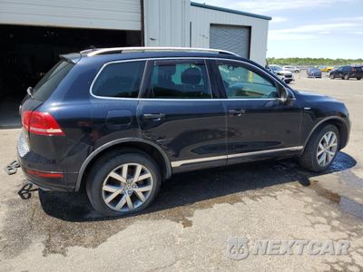 Czwarte zdjęcie samochodu z boku: 2014 VOLKSWAGEN TOUAREG V6 TDI VIN:WVGEP9BP4ED010414 - miniatura