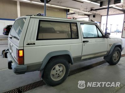 Trzecie zdjęcie samochodu z tyłu: 1990 JEEP CHEROKEE LAREDO VIN:1J4FJ57L1LL166898 - miniatura