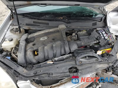 Zdjęcie 12 z 13 samochodu: 2007 KIA OPTIMA LX VIN:KNAGE123175144809 - miniatura