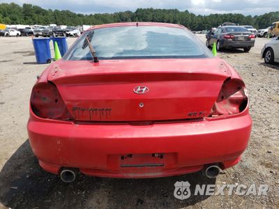 Zdjęcie 6 z 13 samochodu: 2004 HYUNDAI TIBURON GT VIN:KMHHN65F64U146613 - miniatura