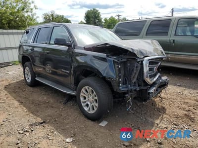 Czwarte zdjęcie samochodu z boku: 2016 GMC YUKON SLT VIN:1GKS2BKC4GR472704 - miniatura