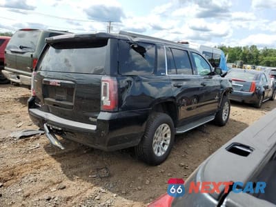 Trzecie zdjęcie samochodu z tyłu: 2016 GMC YUKON SLT VIN:1GKS2BKC4GR472704 - miniatura