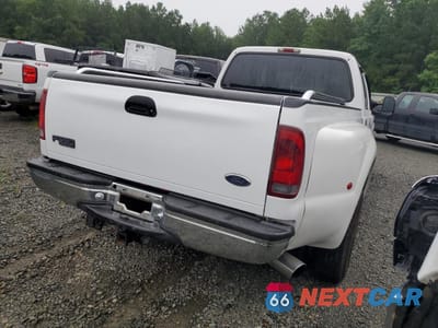 Trzecie zdjęcie samochodu z tyłu: 2002 FORD F350 SUPER DUTY VIN:1FTWW32F92EA26422 - miniatura