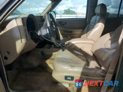 Zdjęcie 7 z 15 samochodu: 1999 GMC JIMMY VIN:1GKCS13W8X2516655 - miniatura