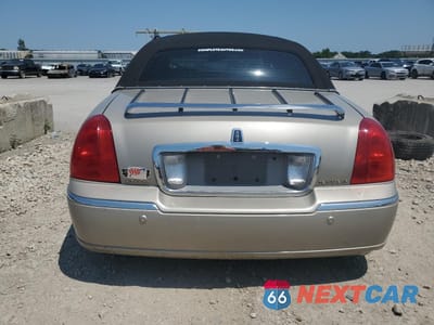 Zdjęcie 6 z 13 samochodu: 2004 LINCOLN TOWN CAR ULTIMATE LONG WHEELBASE VIN:1LNHM85W24Y652396 - miniatura