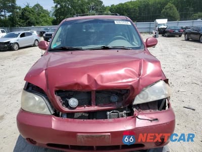 Piąte zdjęcie samochodu w środku: 2005 KIA SEDONA EX VIN:KNDUP132256662909 - miniatura