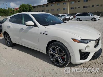 Czwarte zdjęcie samochodu z boku: 2022 MASERATI LEVANTE BASE VIN:ZN661XUA4NX394635 - miniatura
