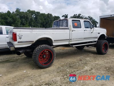 Trzecie zdjęcie samochodu z tyłu: 1993 FORD F350 VIN:2FTJW36M7PCA82360 - miniatura