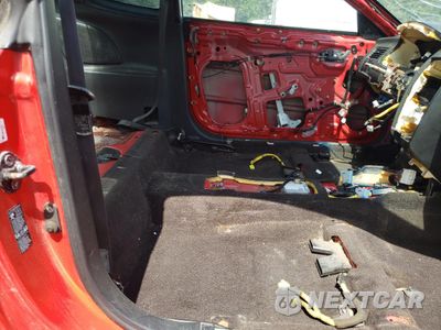 Zdjęcie 10 z 13 samochodu: 2004 HYUNDAI TIBURON GT VIN:KMHHN65F64U146613 - miniatura