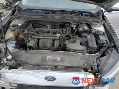 Zdjęcie 11 z 13 samochodu: 2014 FORD FUSION S VIN:1FA6P0G70E5401377 - miniatura