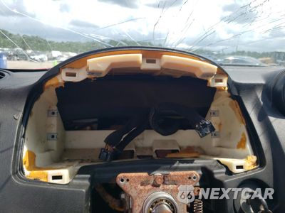 Zdjęcie 9 z 13 samochodu: 2004 HYUNDAI TIBURON GT VIN:KMHHN65F64U146613 - miniatura