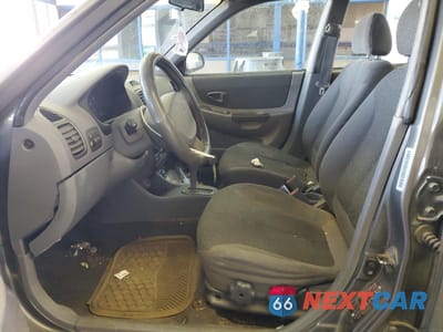 Zdjęcie 7 z 12 samochodu: 2001 HYUNDAI ACCENT GL VIN:KMHCG45C81U225775 - miniatura