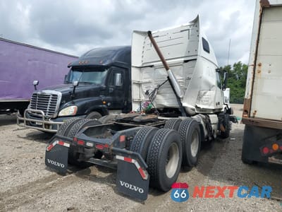 Czwarte zdjęcie samochodu z boku: 2012 VOLVO VN VNL VIN:4V4NC9EJ6CN544761 - miniatura