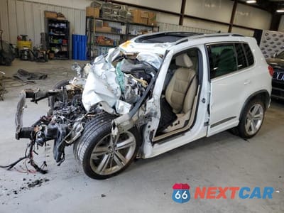 2015 VOLKSWAGEN TIGUAN S WVGAV7AX5FW015900 - główne zdjęcie licytacji z USA - miniatura