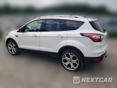 Drugie zdjęcie samochodu z przodu: 2017 FORD ESCAPE TITANIUM VIN:1FMCU0J94HUD34529 - miniatura