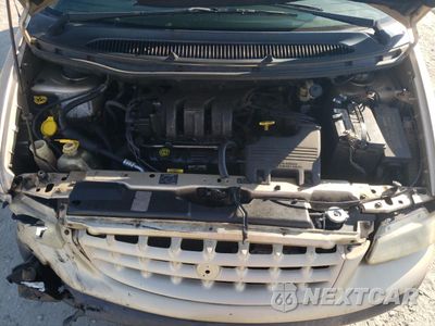 Zdjęcie 12 z 13 samochodu: 2000 PLYMOUTH VOYAGER SE VIN:2P4GP45G7YR594798 - miniatura