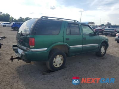 Trzecie zdjęcie samochodu z tyłu: 1999 GMC JIMMY VIN:1GKCS13W8X2516655 - miniatura