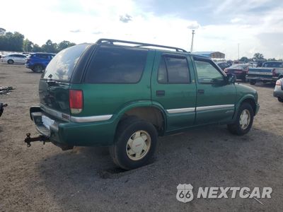 Trzecie zdjęcie samochodu z tyłu: 1999 GMC JIMMY VIN:1GKCS13W8X2516655 - miniatura