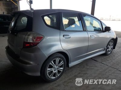 Trzecie zdjęcie samochodu z tyłu: 2010 HONDA FIT SPORT VIN:JHMGE8H69AS012501 - miniatura